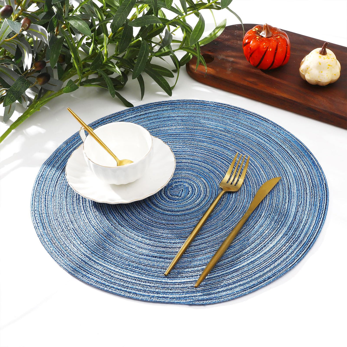 SHACOS blue-gray placemats under lighting show subtle shimmer