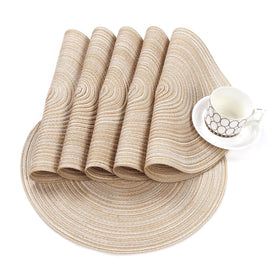 Stacked SHACOS placemats demonstrating compact storage and versatility
