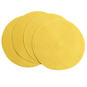 SHACOS round placemats with braid detail add subtle shimmer to the table.