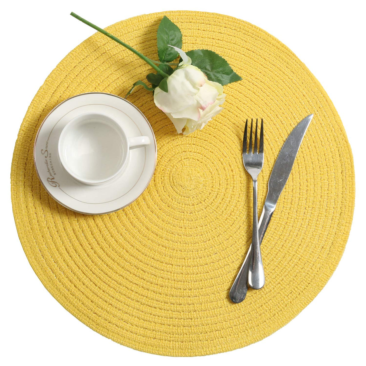SHACOS round placemats in yellow dress up every dining occasion.
