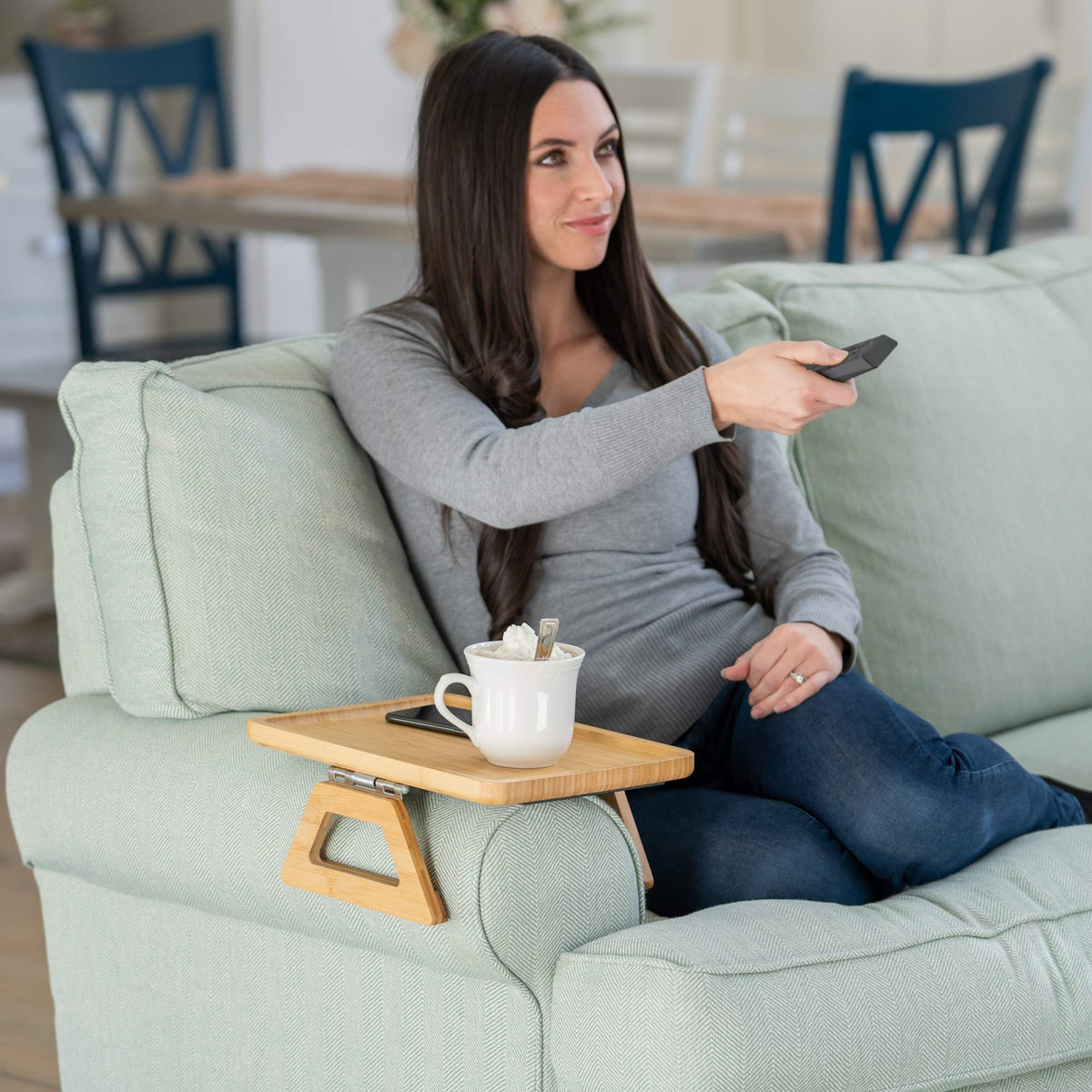 Shamrock Home Bamboo Trayble couch arm table side view shows compact design.