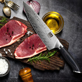 SHAN ZU Chef Knife ergonomic grip for comfortable cutting.