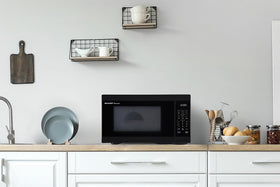 Sharp 1000W auto cook menu button guides reheating for common items.