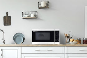 Weight and Time Defrost function on the SHARP microwave for flexible thawing.