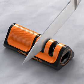 Compact Orange Ninja Mini Sharpener design supports on-the-go blade care.