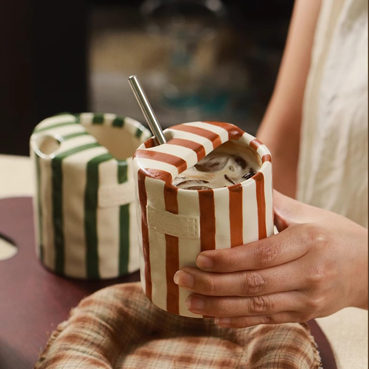 Shelprojsu hand-painted stripe mug adds artisanal charm to any space.