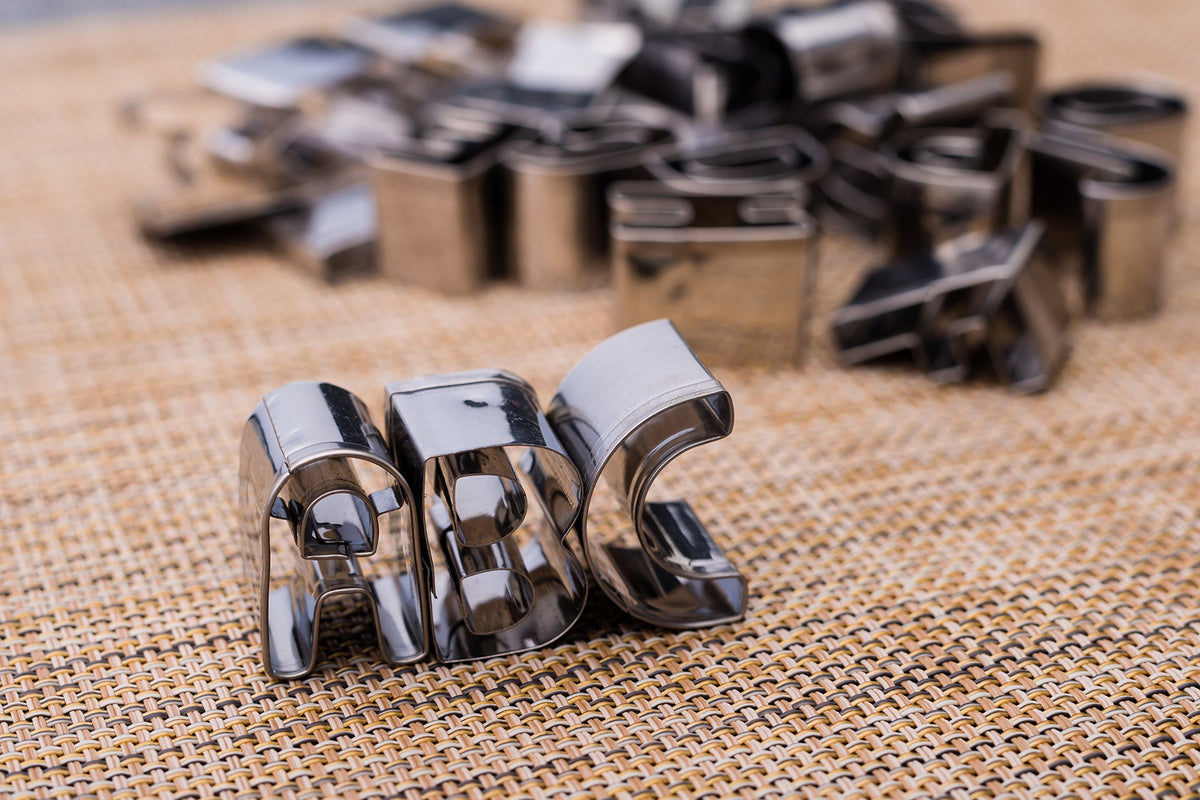 ShengHai SurgeHai stainless steel fondant letters offer durable cake decoration