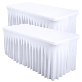 Shillance white spandex table cover on a 6ft table with a smooth, fitted look that hides legs.