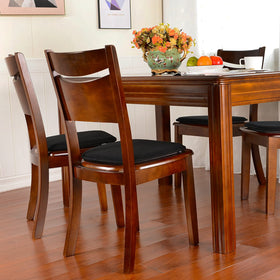 Shinnwa black cushion complements modern dining spaces.