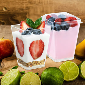 ShopDAY clear square cups at catering stations for easy serving.