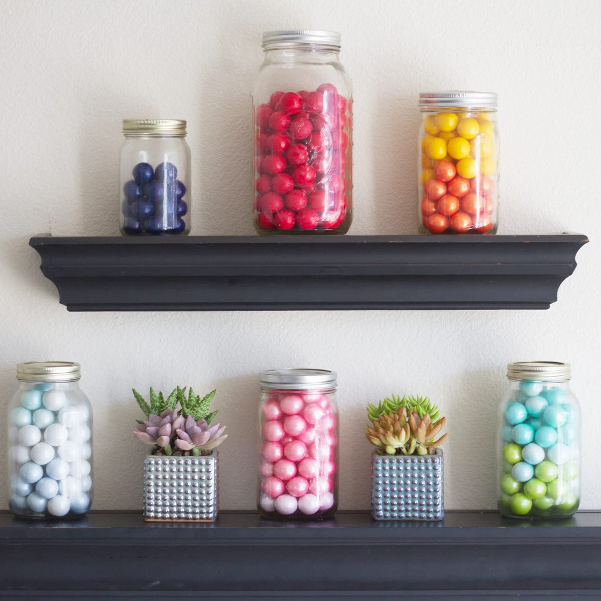 Showutheworld jars filled with spices showing practical storage solutions.