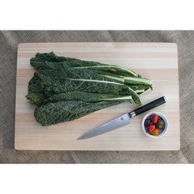 Shun Classic 6-inch knife handle close-up showing secure D-shaped grip.