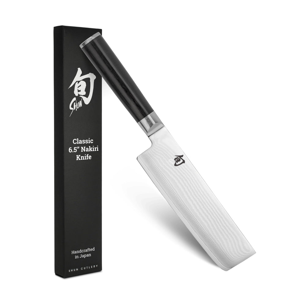 Shun Classic 6.5-Inch Nakiri blade close-up for precise vegetable slicing.