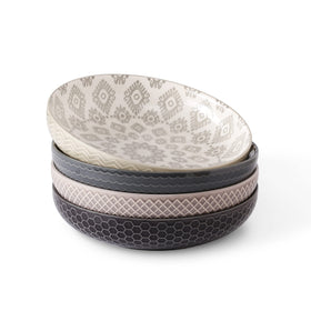 Signature Housewares 36oz shallow bowls in four colors for vibrant table styling.