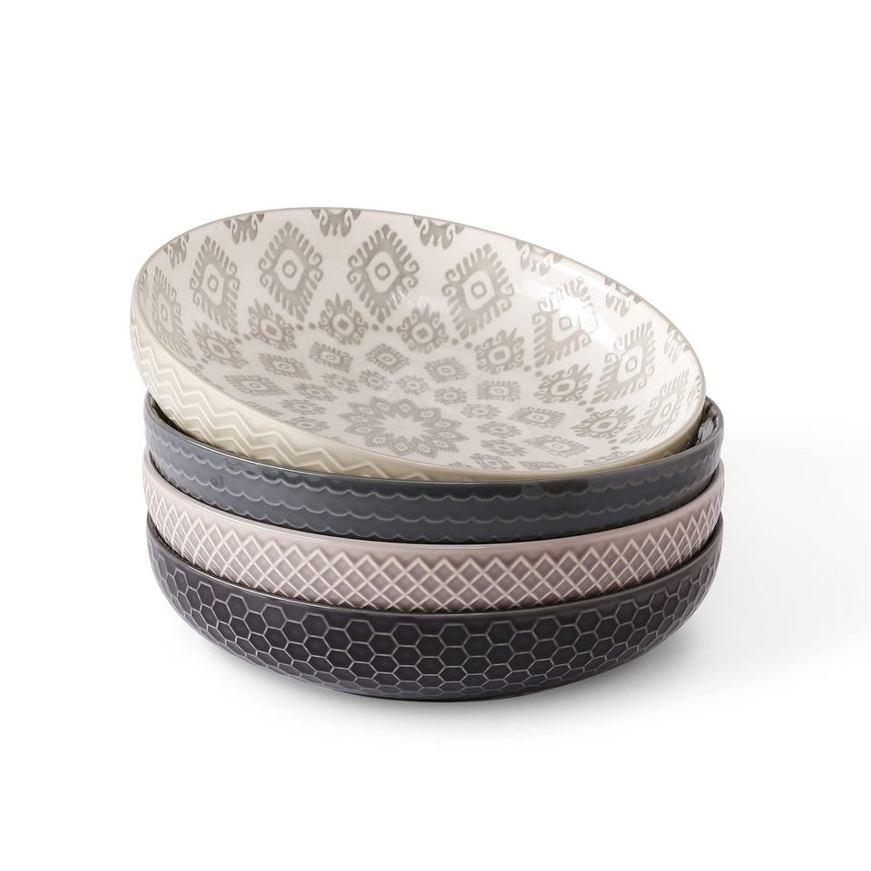 Signature Housewares 36oz shallow bowls in four colors for vibrant table styling.