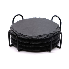 SIJDIEE 4-inch round slate coaster set on table, showcasing natural black stone and round shape for protection and style.