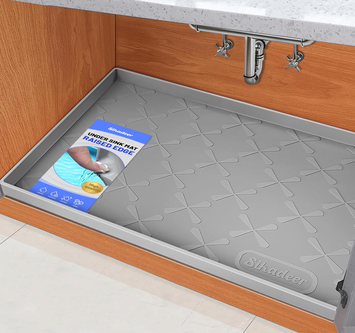 SIKADEER under-sink mat with raised edges protects cabinets from spills