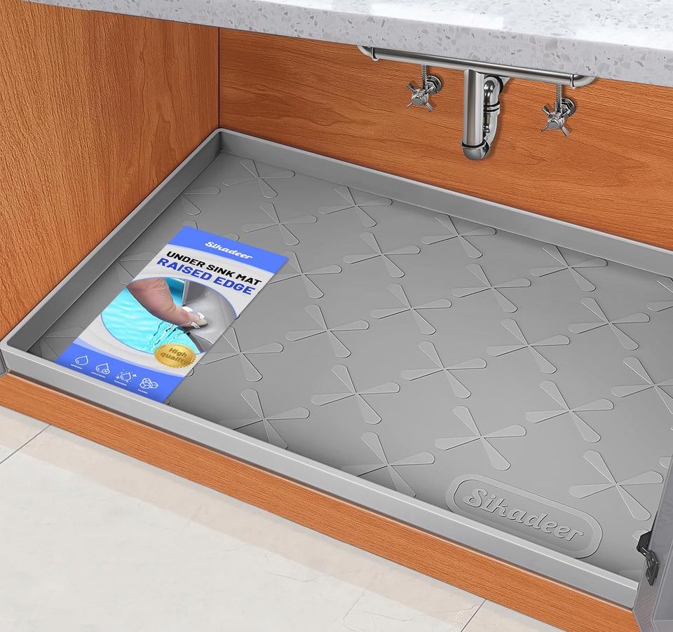 SIKADEER under-sink mat with raised edges protecting cabinets from spills