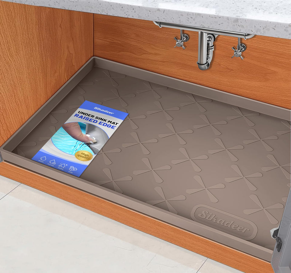 SIKADEER under-sink mat with raised edges protects cabinets from leaks and spills.