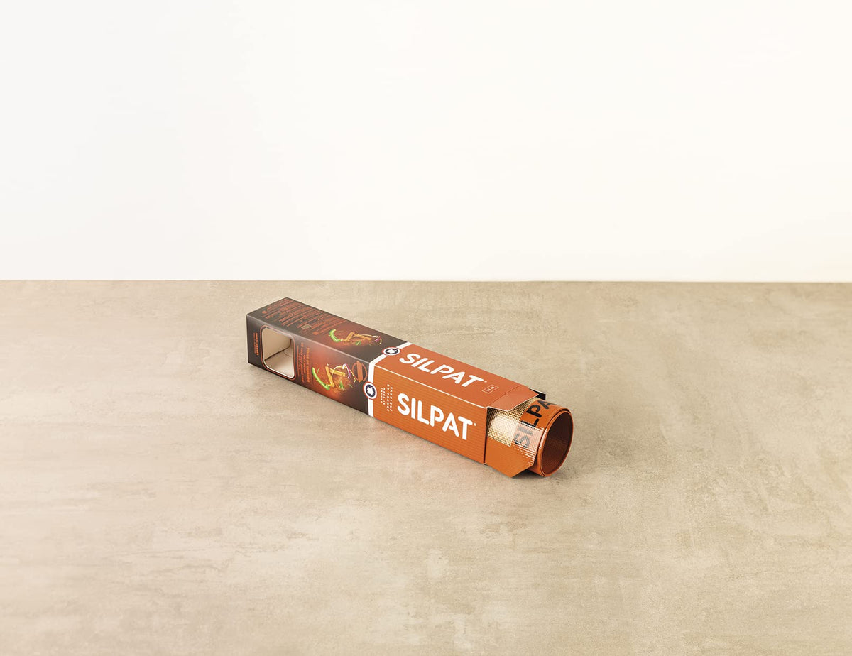 Silpat measures 12x17 inches to fit a standard 13x18 pan