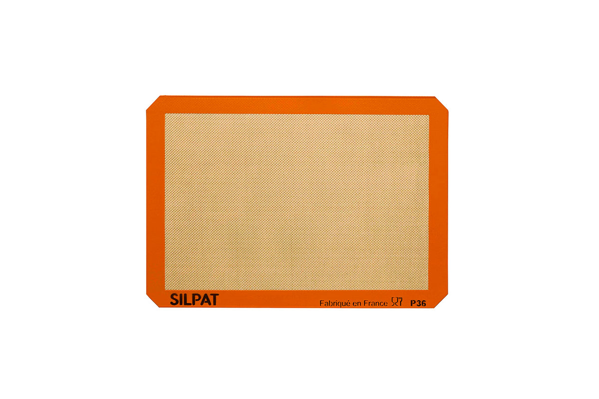 Silpat cookie mat 12x17 on a pan for even oil-free cookies