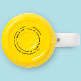 Silver Buffalo Peanuts tumbler with handle and lid for secure transport.