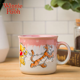 Silver Buffalo Winnie the Pooh characters on mug with playful, colorful artwork.