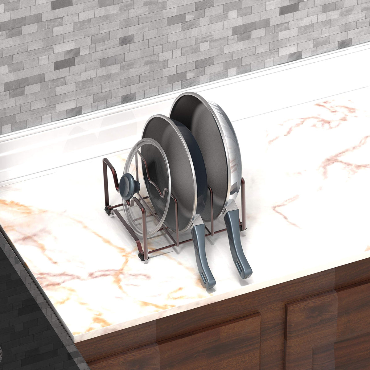 Simple Houseware bronze rack supports pans while saving cabinet space.