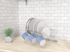 Simple Houseware collapsible rack folded for easy storage in a cabinet.