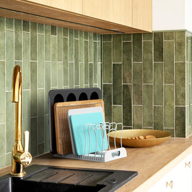 Simple Houseware countertop kitchen organizer keeps lids and platters within reach.