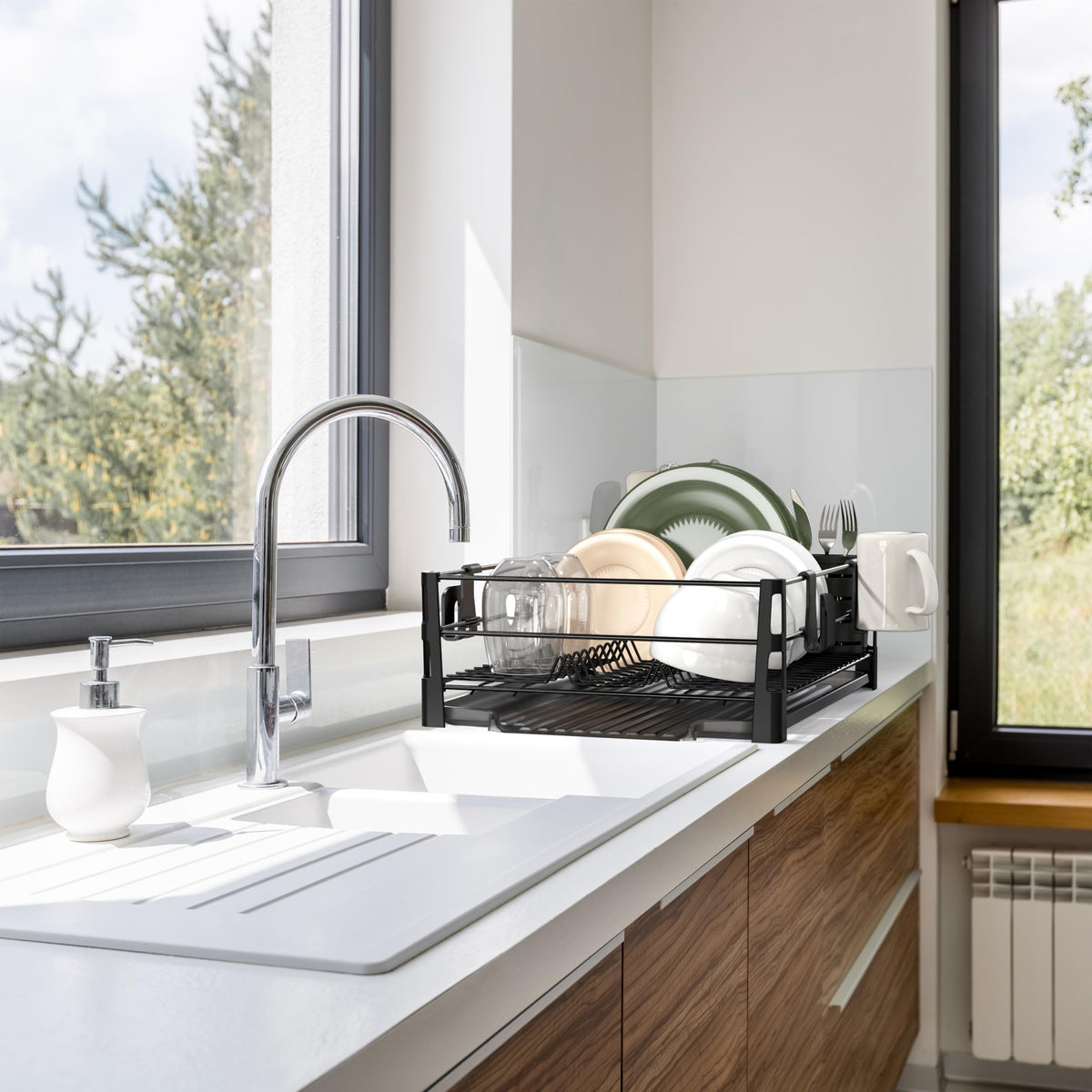 Simple Houseware dish-drying-rack-drainage-system channels water away efficiently.