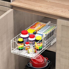 Simple Houseware under-sink pull-out basket keeps cleaning supplies organized.