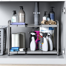 Simple Houseware rack organizes cleaning supplies and toiletries under kitchen and bathroom sinks.