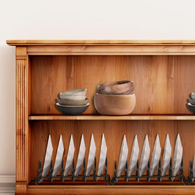 Simple Houseware 6-compartment rack helps organize dinnerware for daily use.