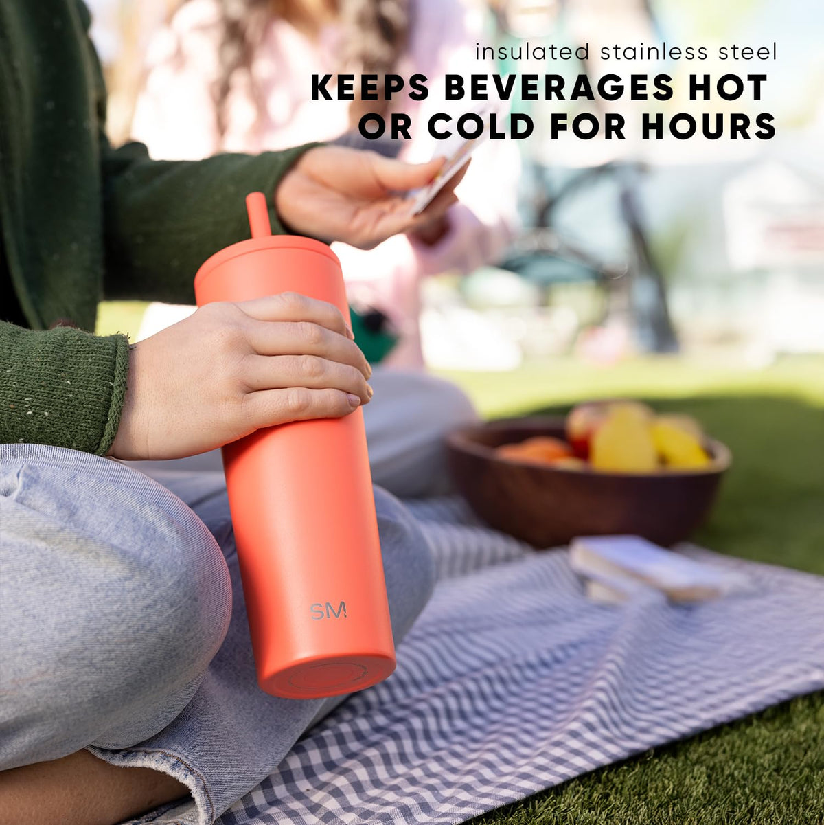 Forest tumbler's vacuum insulation preserves temperature without condensation on hands.
