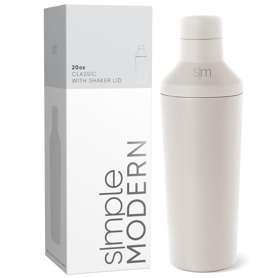 Simple Modern cocktail shaker with lid-jigger for precise pours in almond birch finish