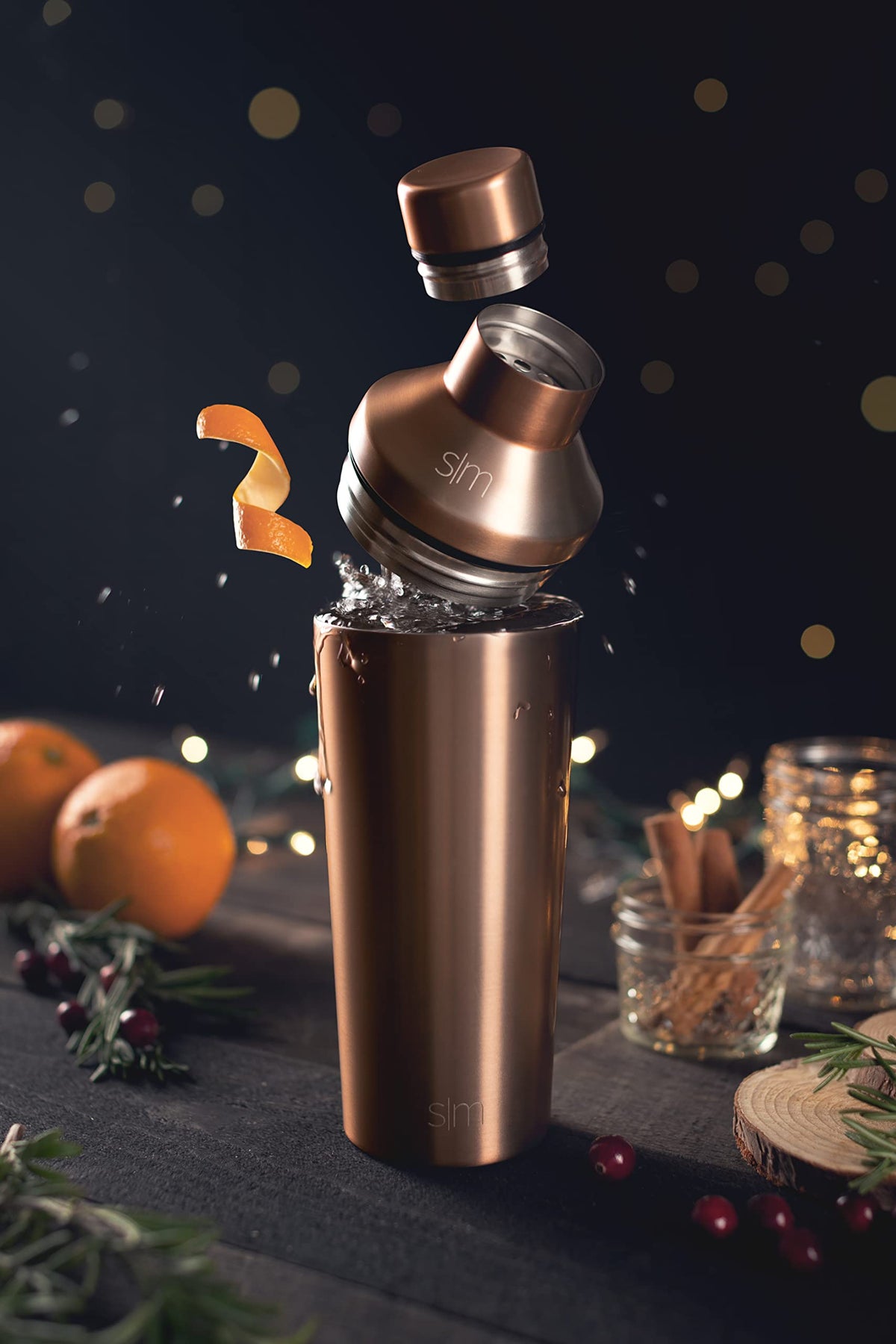 Simple Modern stainless steel shaker in metallic gold keeps drinks chilled without sweating.