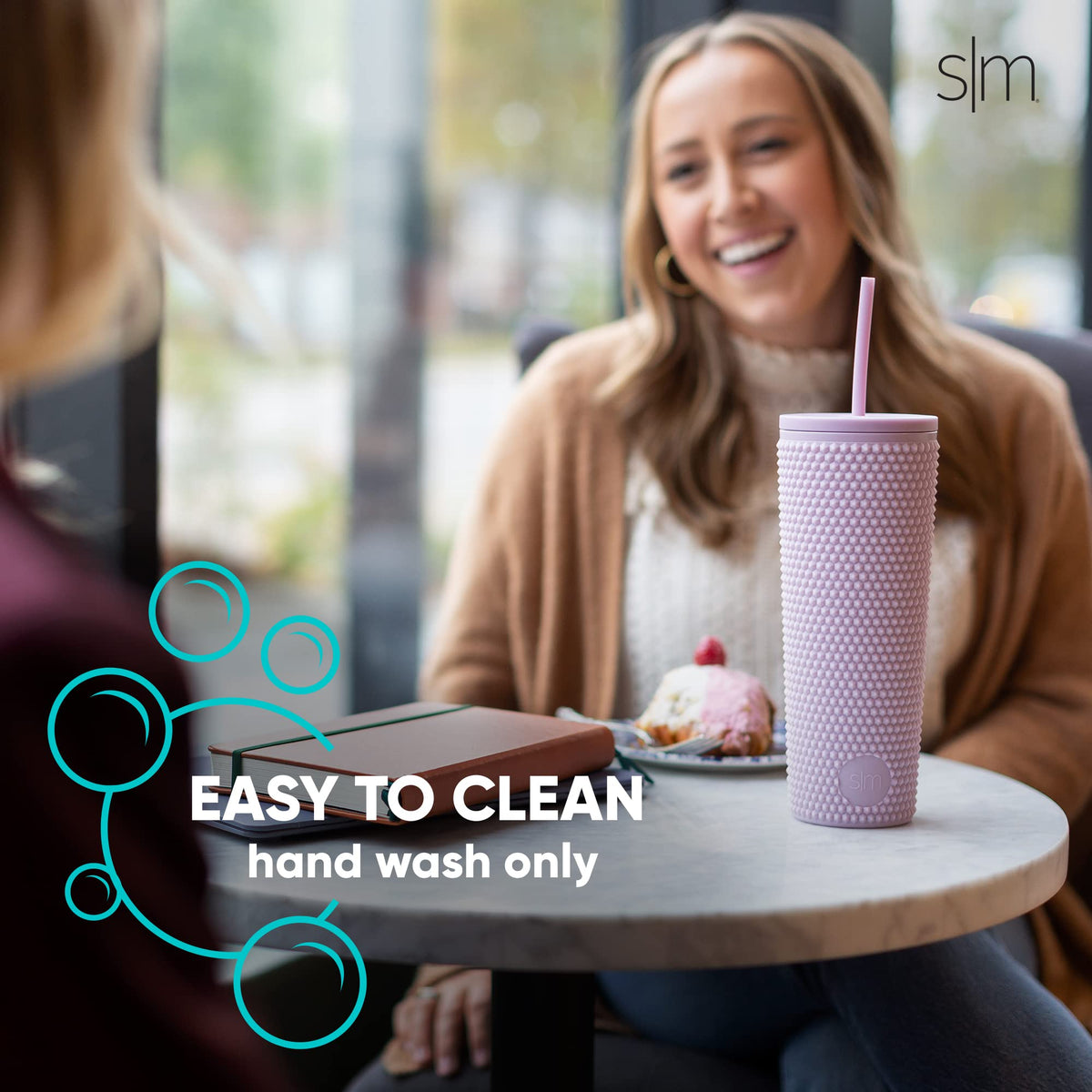 Simple Modern studded tumbler with two reusable straws for travel and refills.