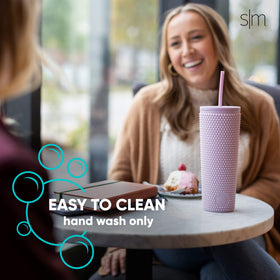 Simple Modern studded tumbler with two reusable straws for travel and refills.