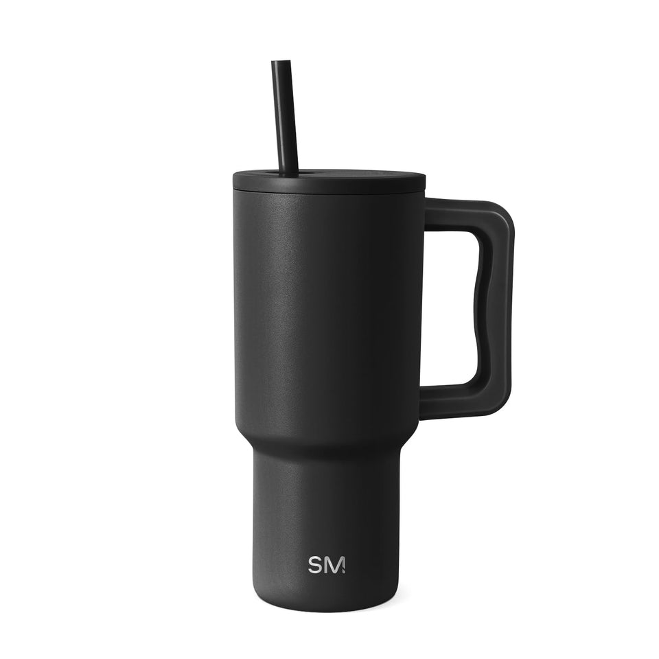 Simple Modern Trek tumbler with handle and lid for on-the-go sipping.