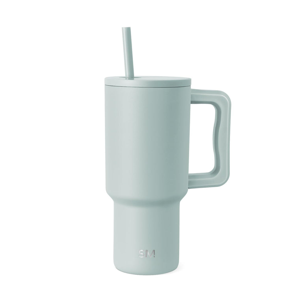 Simple Modern Trek tumbler with handle offers a comfortable grip for on-the-go sipping.