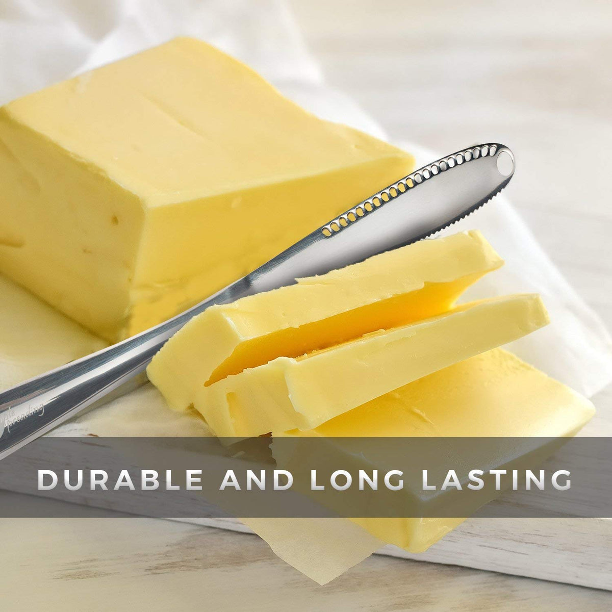 Simple preading butter spreader in action, spreading evenly on toast.
