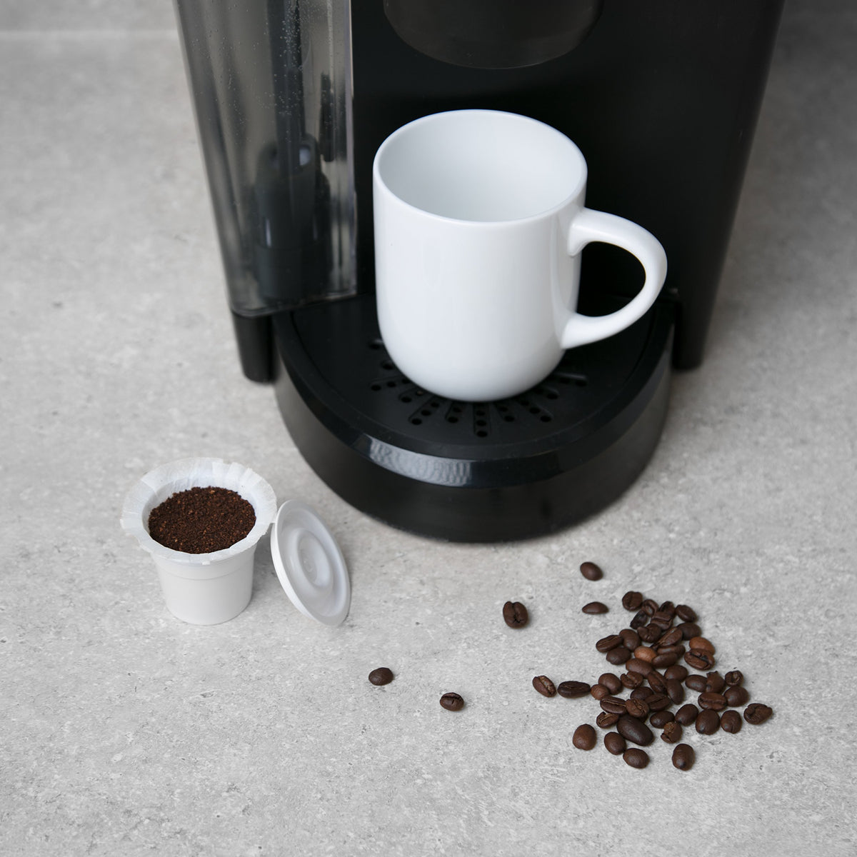 SIMPLECUPS compatible with K-Cups and reusable pods for flexible brewing options.
