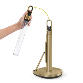 Simplehuman standing paper towel holder with brass spray pump for quick cleanups.