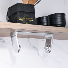 Simpletome kitchen setup shows convenient towel access during cooking.