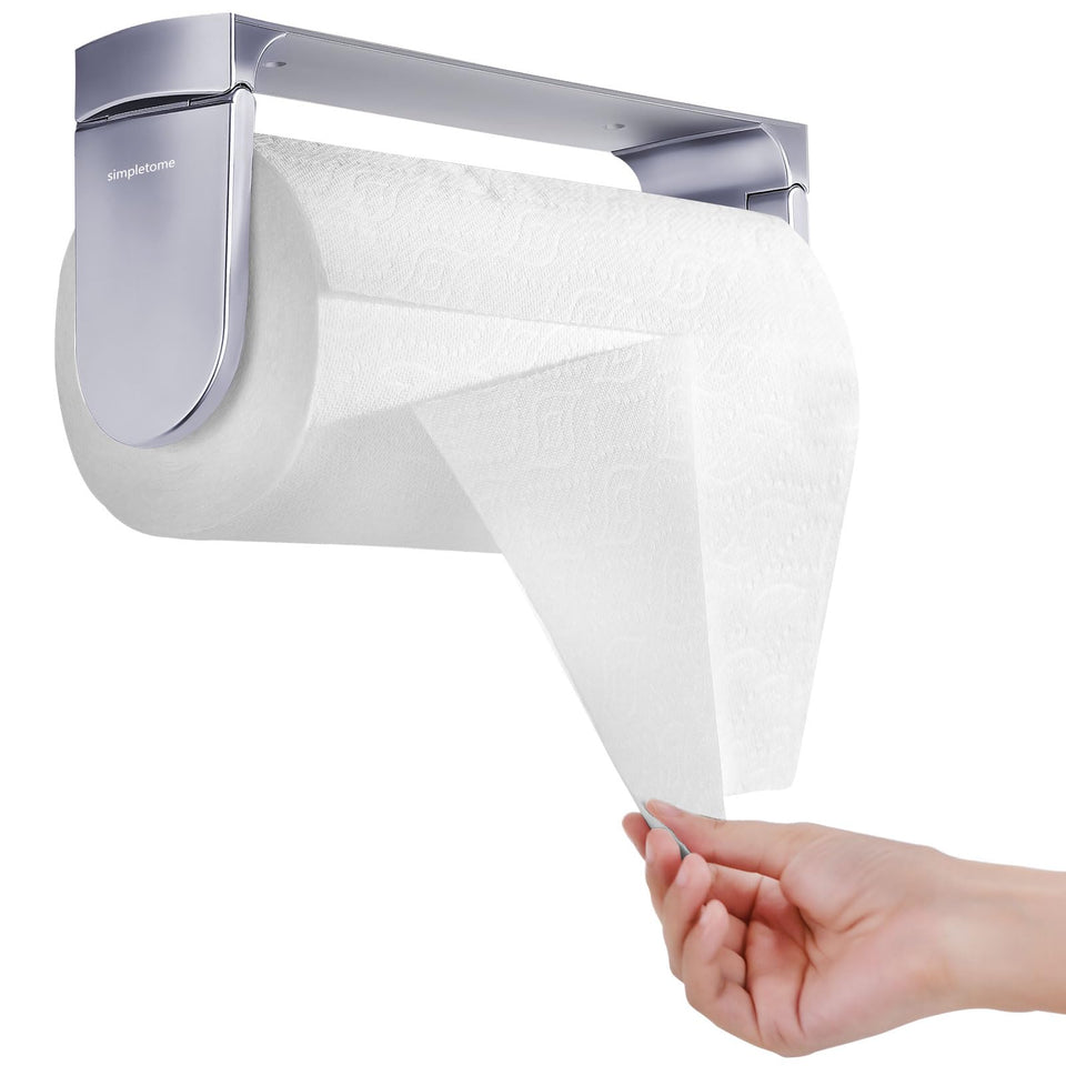 Simpletome One-Hand Tear Holder mounted under cabinet with adhesive for easy access.