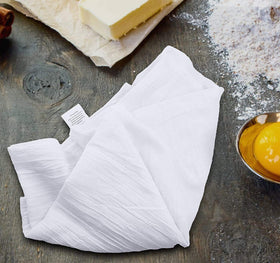 Simpli-Magic Flour Sack Towel used for streak-free window cleaning and shine.