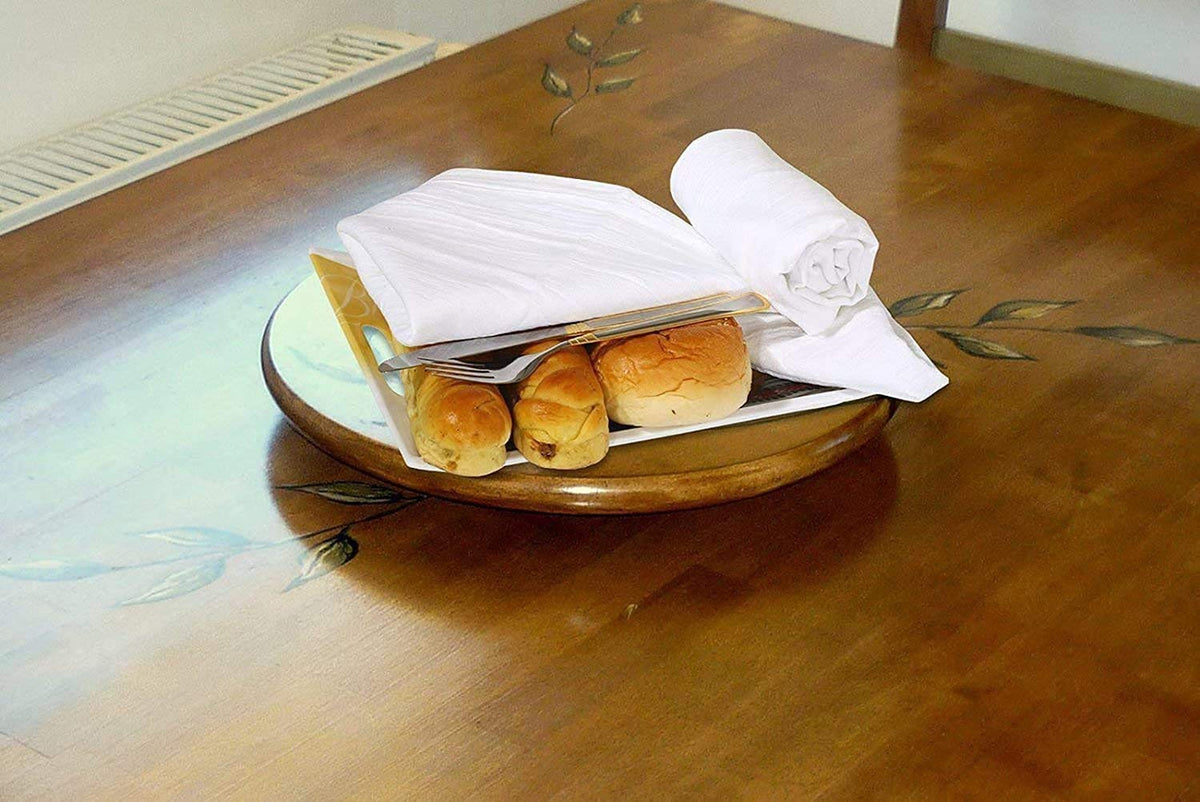 Simpli-Magic Flour Sack Towel wraps warm rolls to keep them cozy.