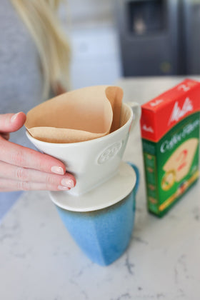 Simply Charmed dripper interior with filter—eco-friendly ritual for coffee lovers.