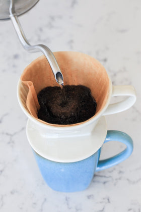 Simply Charmed dripper brewing 8–16 oz for a consistent cup.